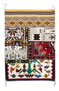 Two Navajo Rugs First: 29 x 42 inches.