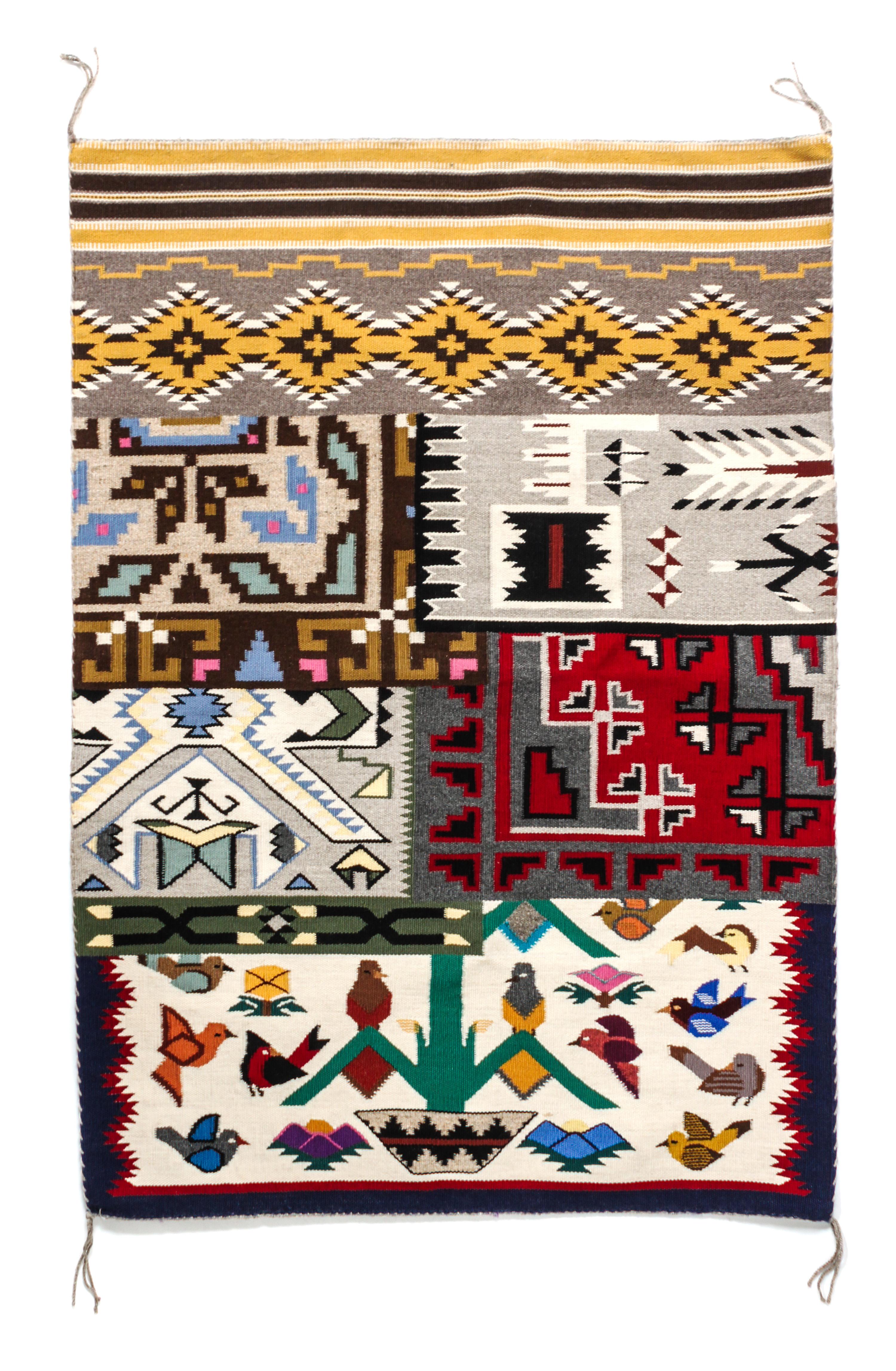 Two Navajo Rugs First: 29 x 42 inches.