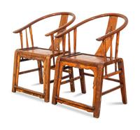 A Pair of Ming Style Elm Horseshoe Back Armchairs