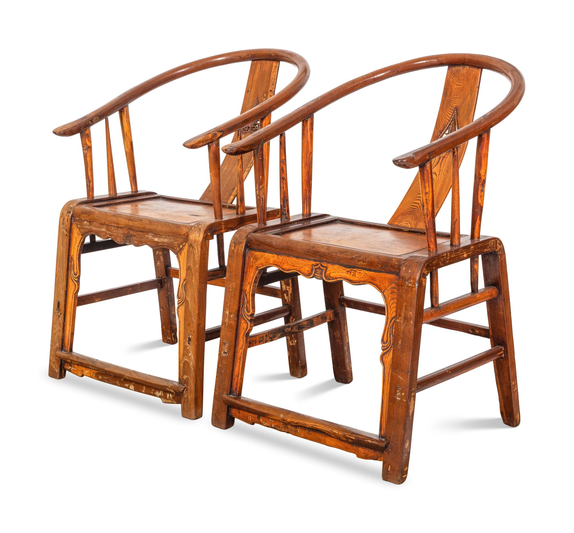 A Pair of Ming Style Elm Horseshoe Back Armchairs