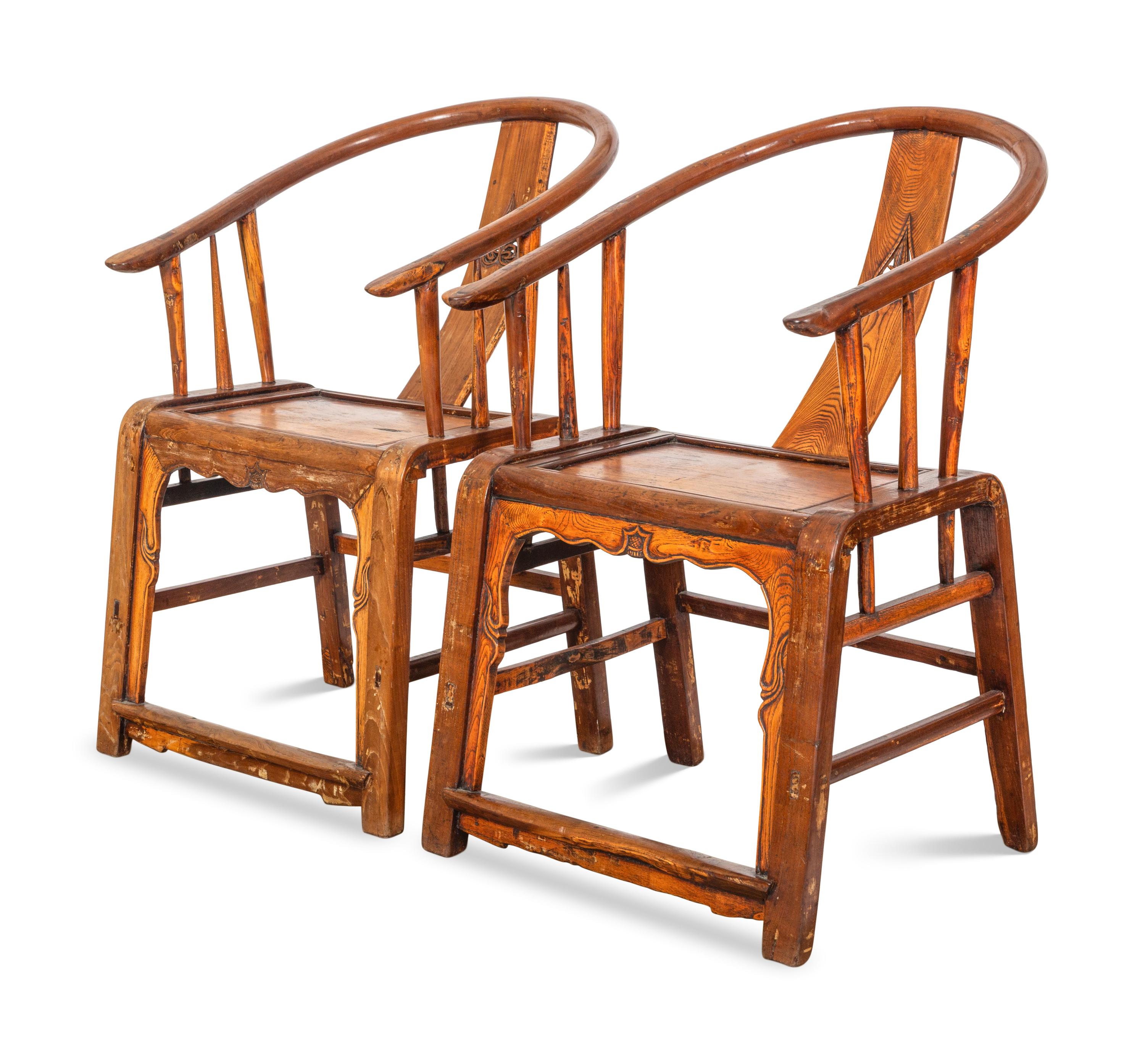A Pair of Ming Style Elm Horseshoe Back Armchairs