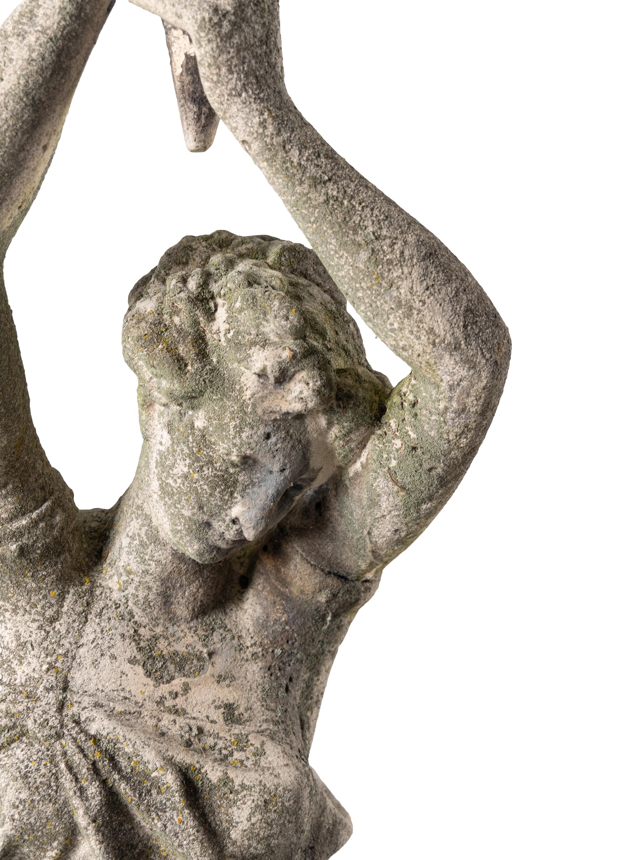 A Carved Limestone Garden Figure
