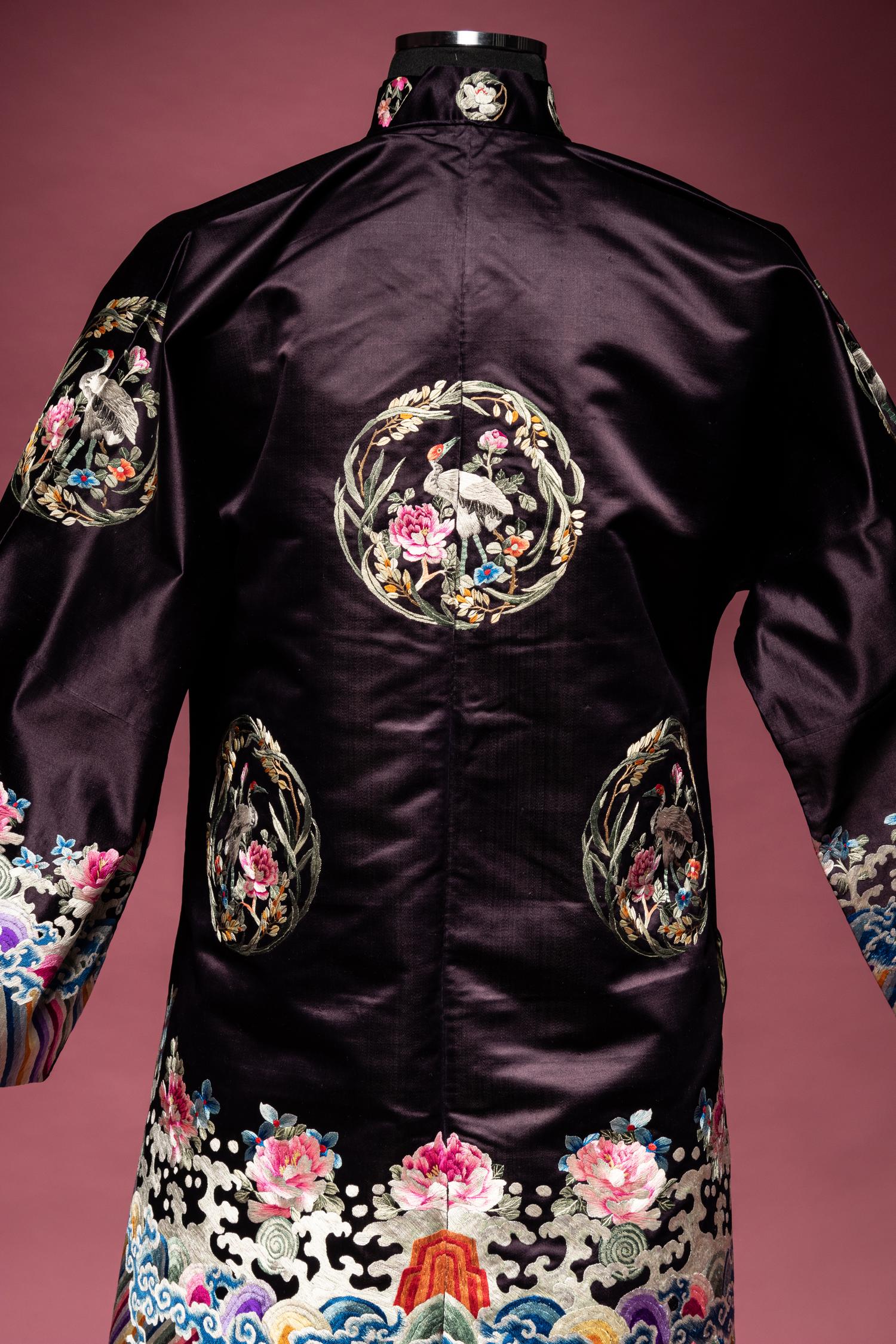 A Set of Aubergine Satin Ground Embroidered Silk Lady's Robe and Skirt