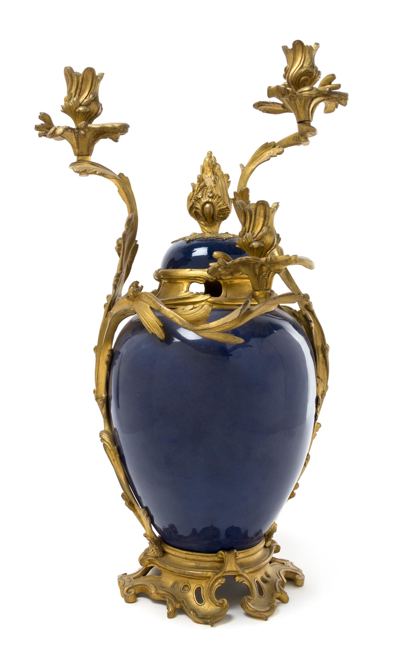 A Louis XV Style Gilt Bronze Mounted Porcelain Vase Height 21 inches.