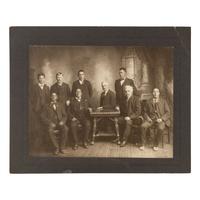 Studio portrait of Major James McLaughlin and Native American Subjects