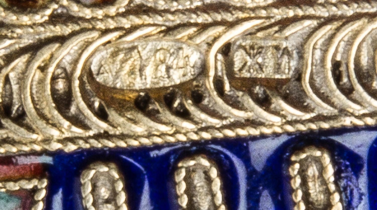 A Russian Enameled Silver Cigarette Case, Maker's mark Cyrillic IZh, Moscow, late 19th/early 20th century, the case worked with floral