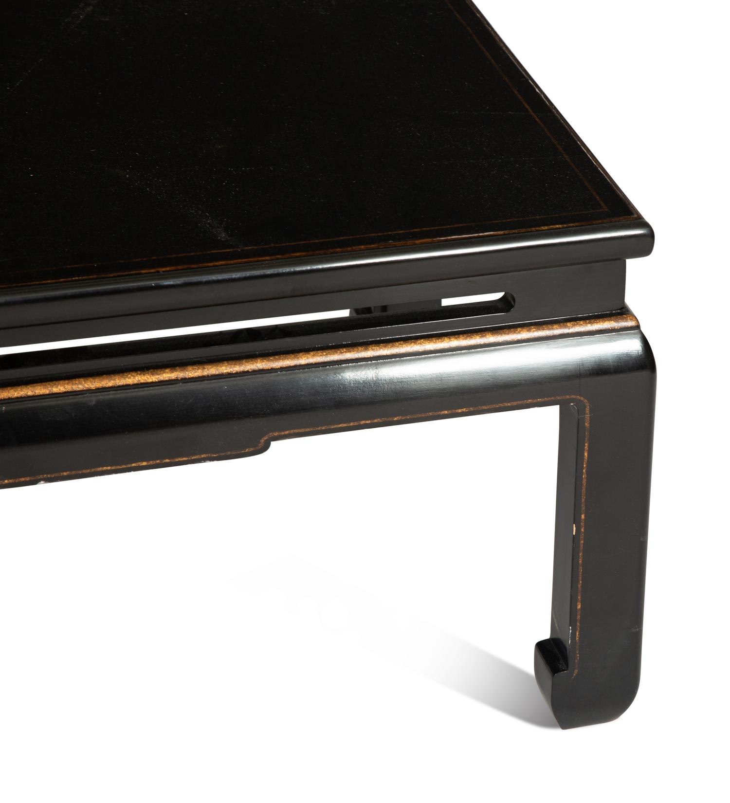 A Chinese Export Ming Style Black and Parcel Gilt Lacquer Low Table