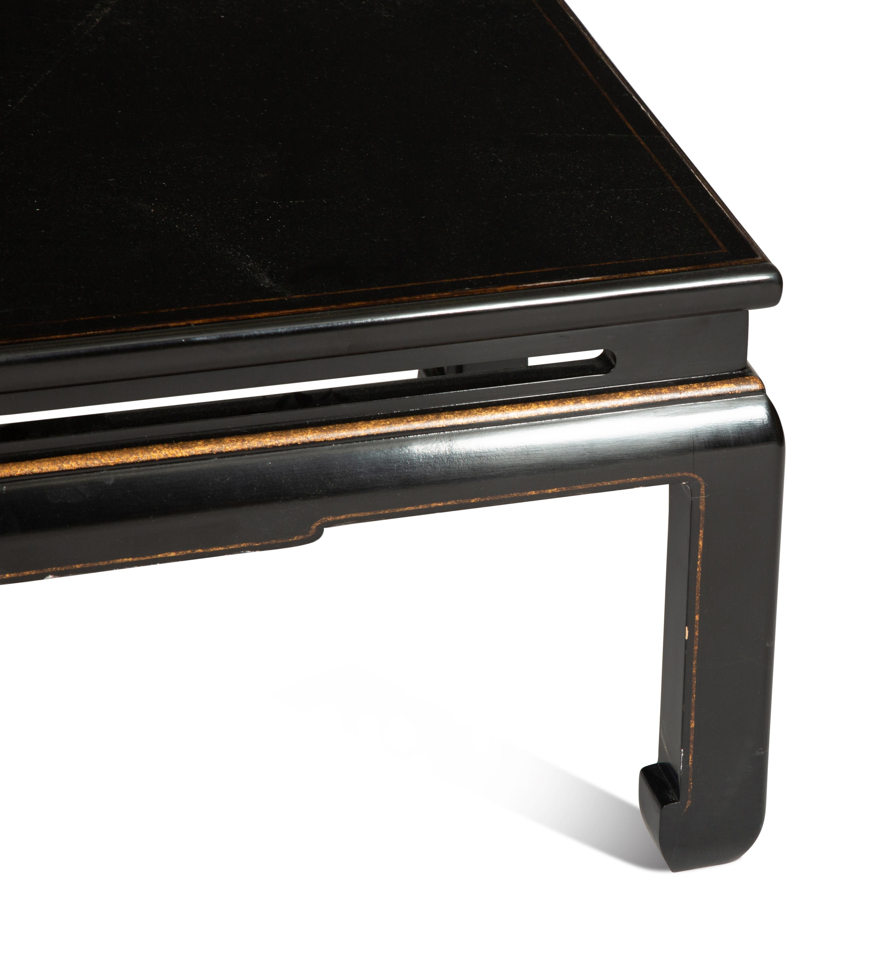 A Chinese Export Ming Style Black and Parcel Gilt Lacquer Low Table