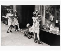 Ruth Orkin (1921-1985) Comic Book Readers, West Village, New York City, 1948