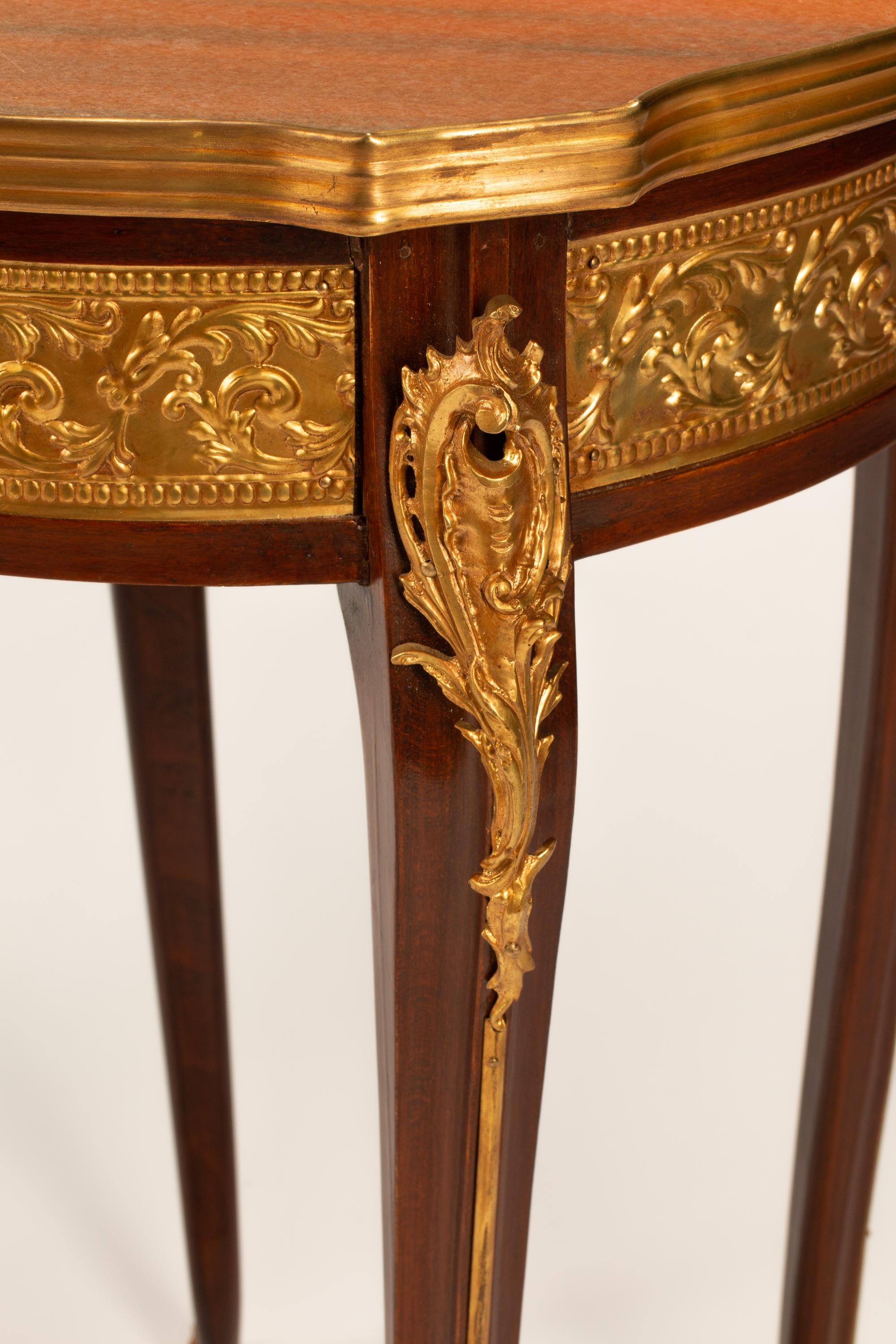 A Pair of Louis XV Style Gilt Bronze and Gilt Metal Mounted Marble-Top Gueridons