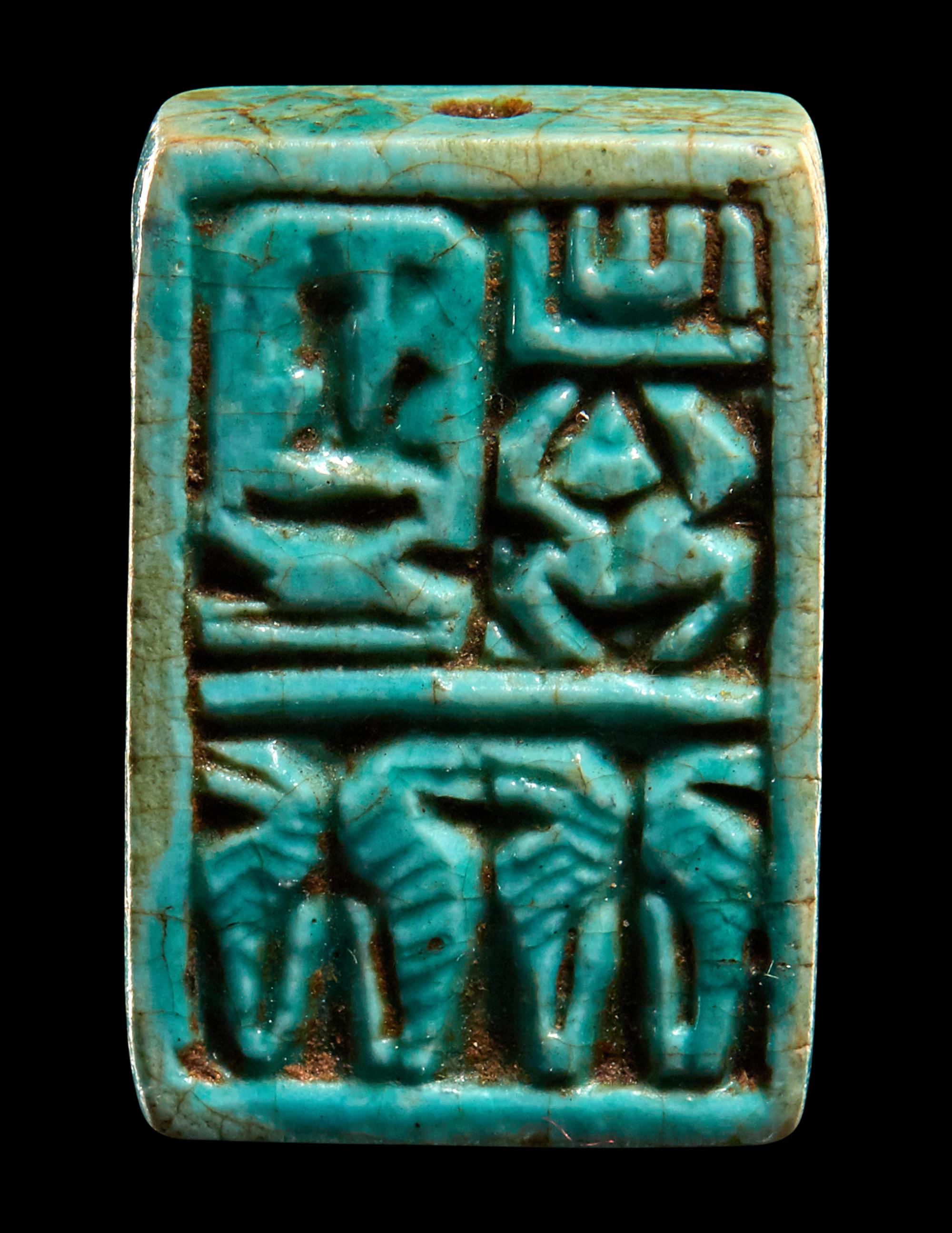 Two Egyptian Faience Seals and an Inscribed Bead