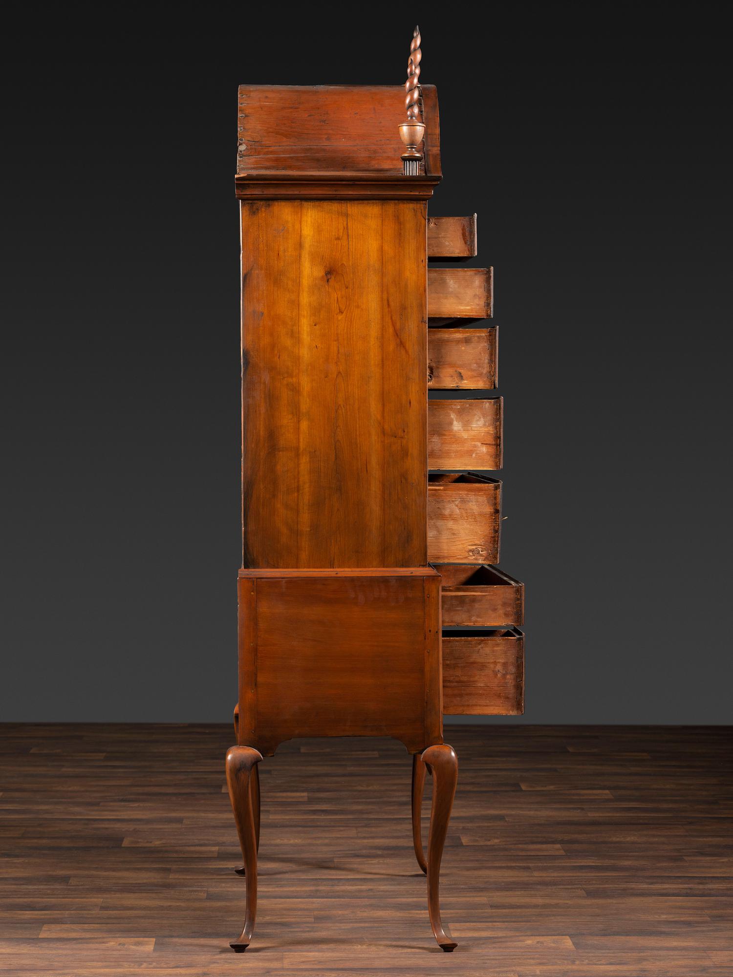 A Queen Anne Fan-Carved Cherrywood Bonnet Top High Chest