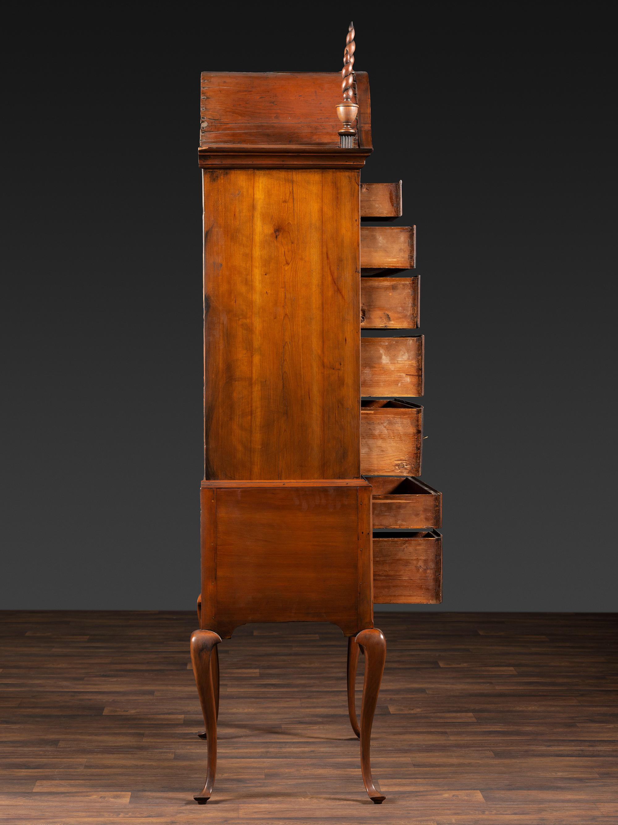 A Queen Anne Fan-Carved Cherrywood Bonnet Top High Chest