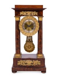 A Charles X Gilt Bronze Mounted Mahogany Portico Clock