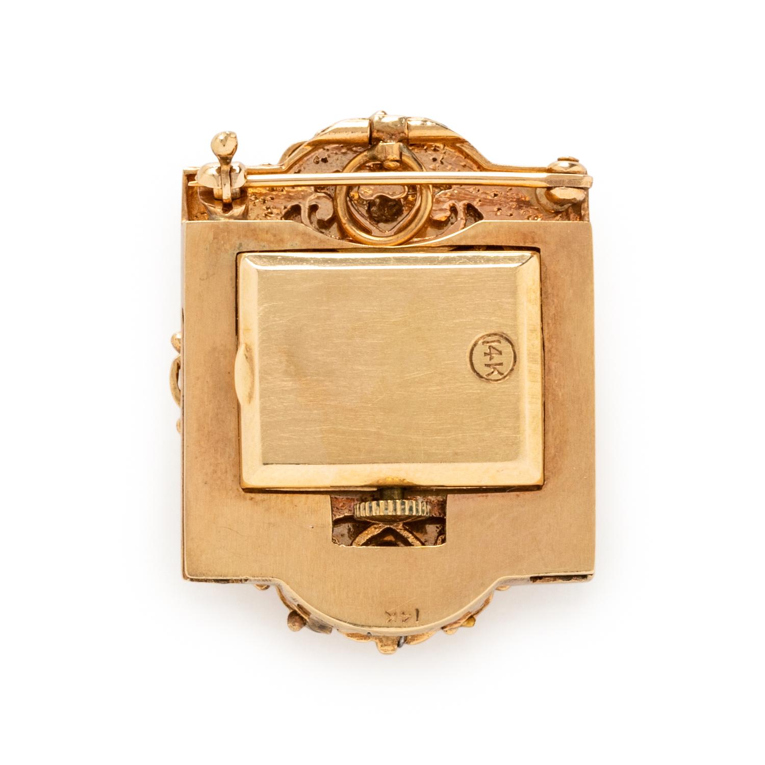 YELLOW GOLD, ENAMEL, AND SEED PEARL SURPRISE WATCH