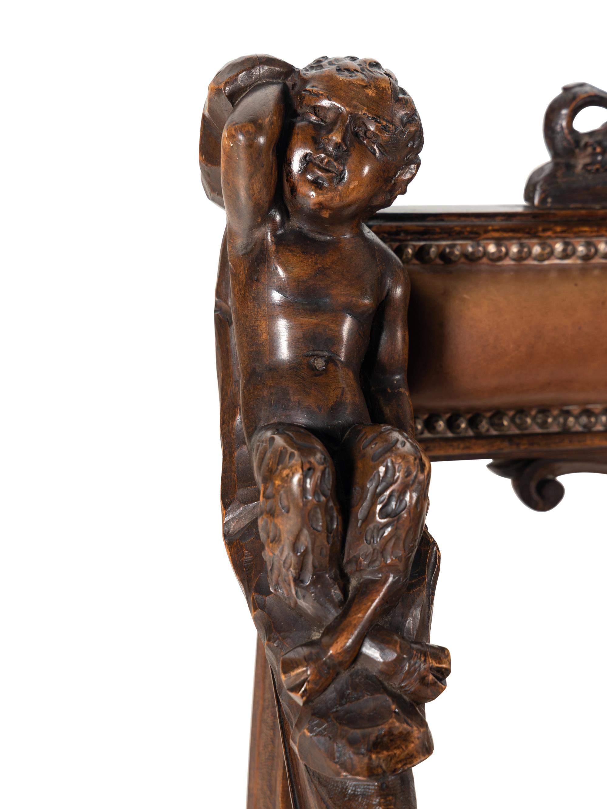 A Venetian Carved Walnut Armchair