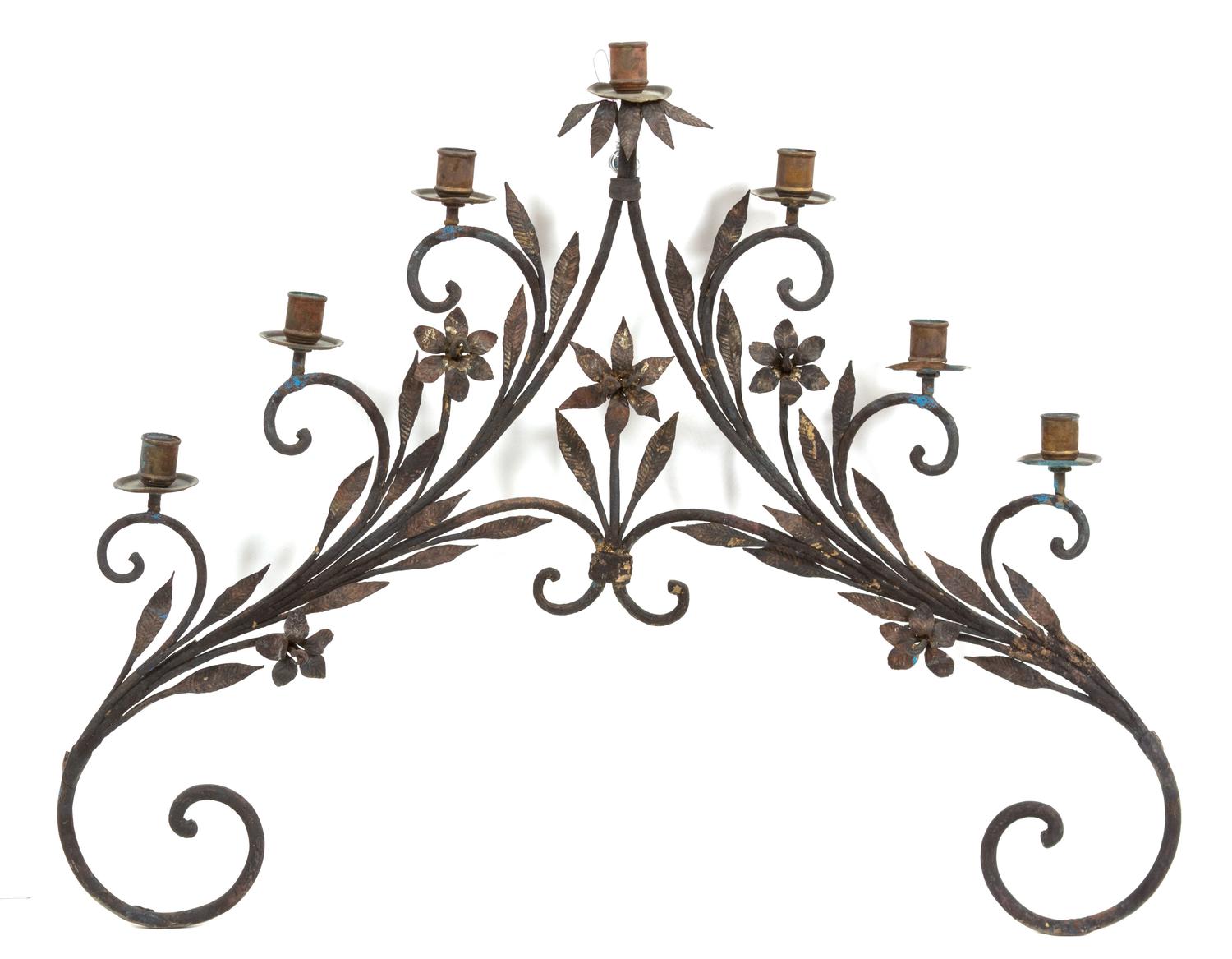 A Continental Wrought Iron Seven-Light Wall Sconce Height 26 x width 30 1/2 inches. — 19TH CENTURY