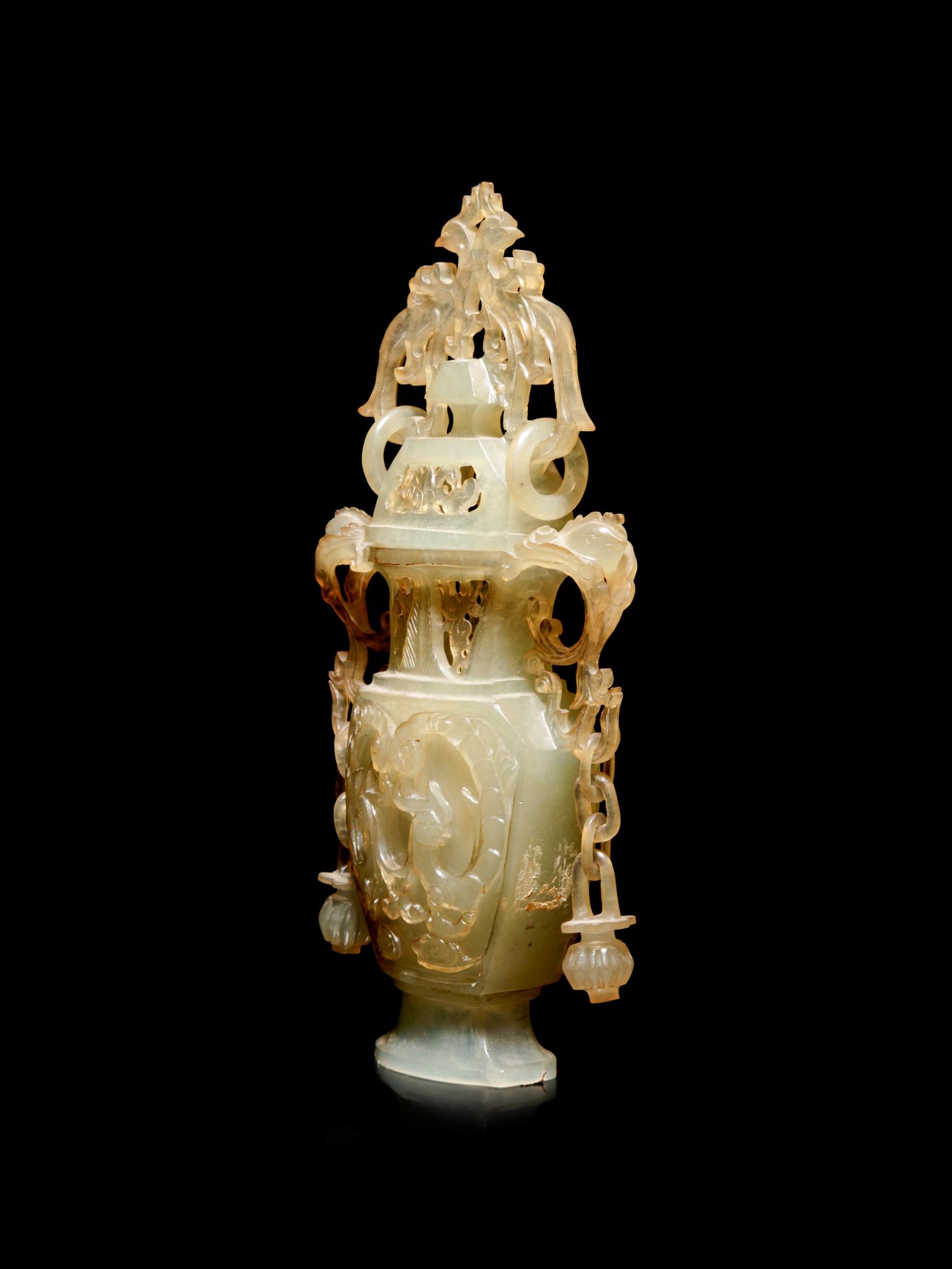 A Carved Serpentine Vase and Cover