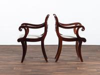 A Pair of Classical Cornucopia Carved Mahogany Armchairs