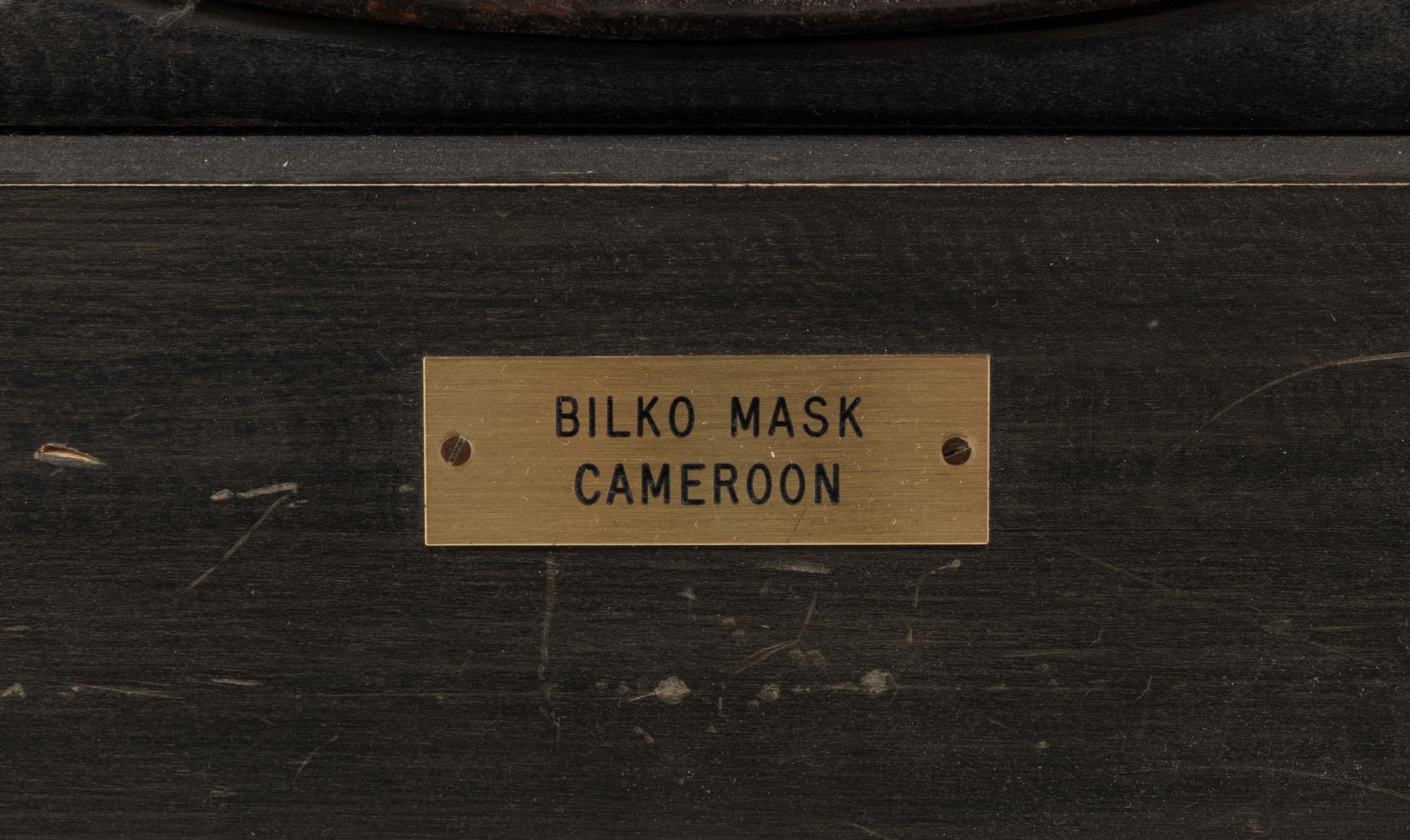 A Bamileke Carved Wood Helmet Mask