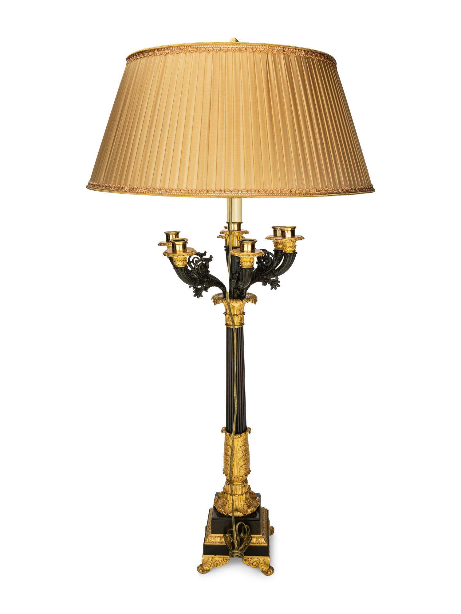 A Pair of Louis Philippe Gilt and Patinated Bronze Seven-Light Candelabra