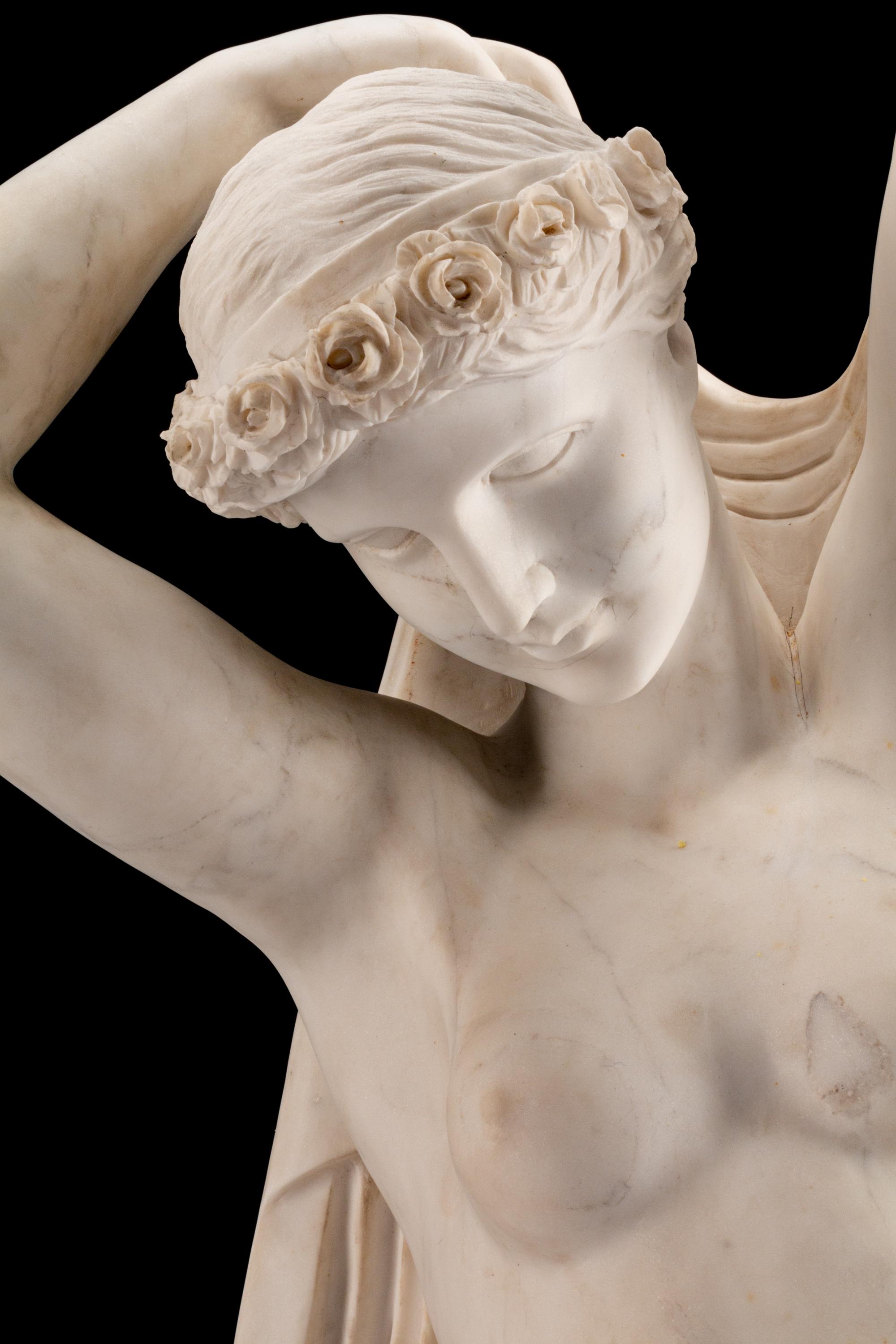 An Italian Marble Figure of Flora and an Infant Attendant