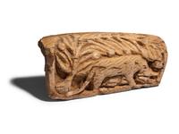 A Coptic Bone Fragment with a Lion Hunting Scene