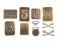 [MILITARIA]. A collection of post-war belt plates and insignia, comprising: