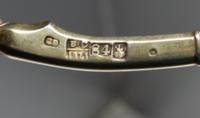 A Group of Four Russian Niello Silver Spoons, Various makers, Moscow, 19th century, each having a twist stem, the undersides with scene