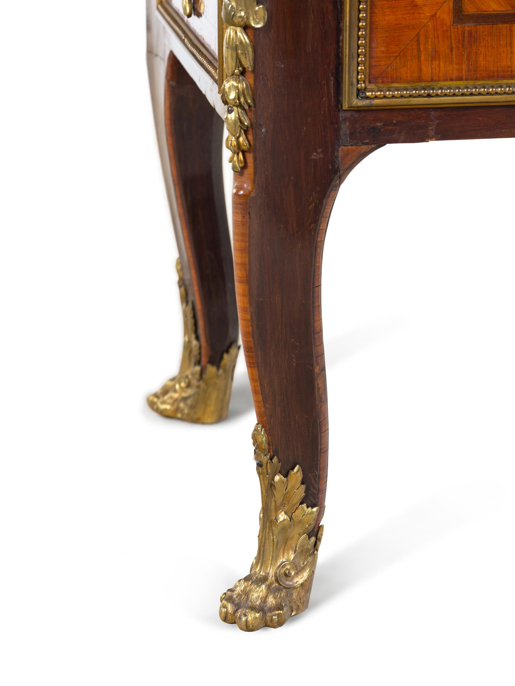 A Louis XV Style Gilt Bronze Mounted Kingwood Cabinet