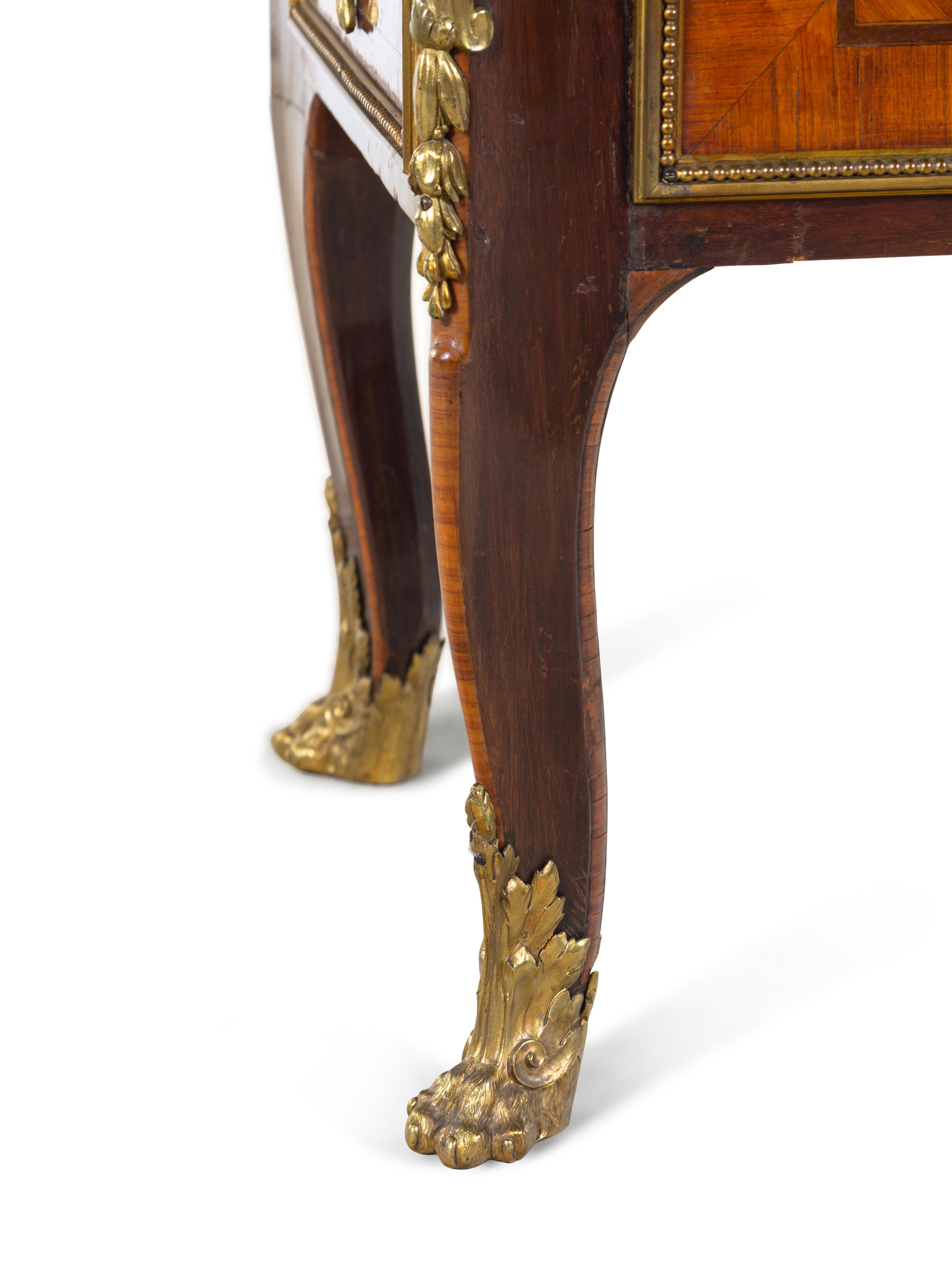 A Louis XV Style Gilt Bronze Mounted Kingwood Cabinet
