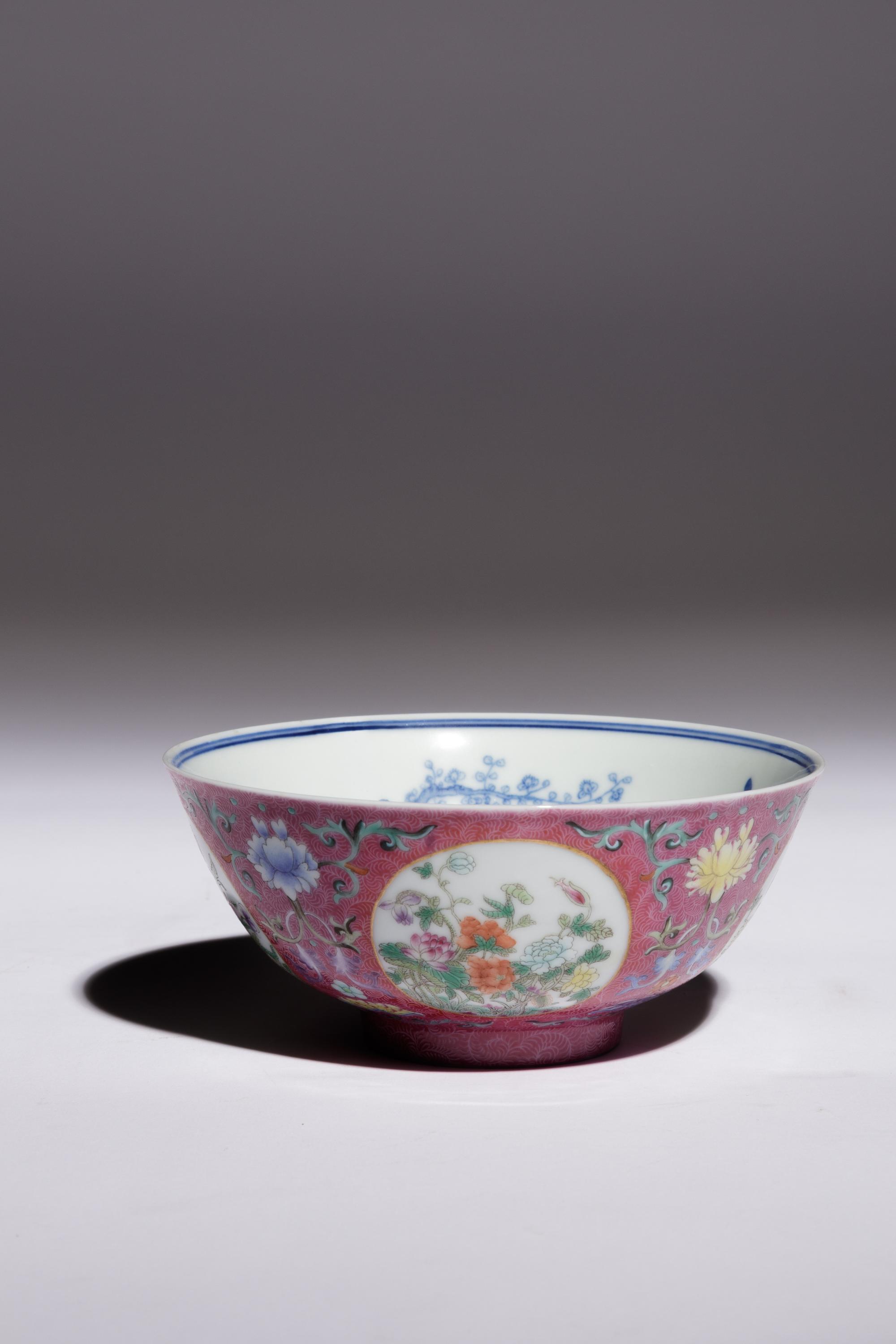 A Ruby Sgraffito Ground Famille Rose and Underglaze Blue Porcelain Bowl