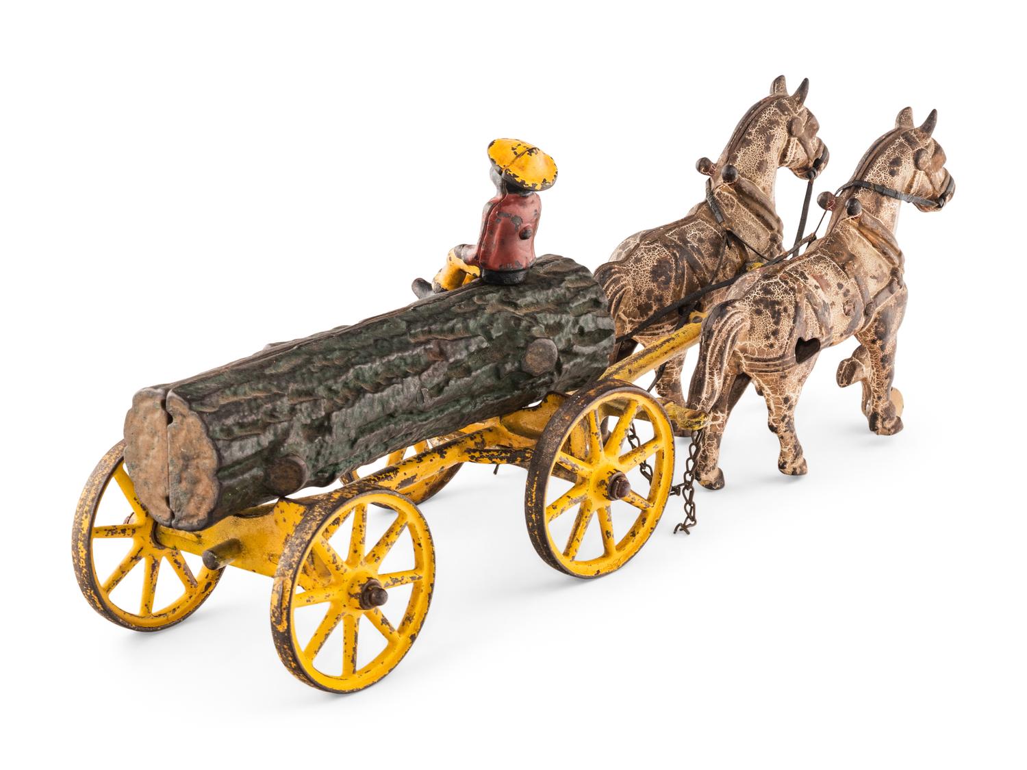 A Group of Three Cast Iron Horse-Drawn Carts