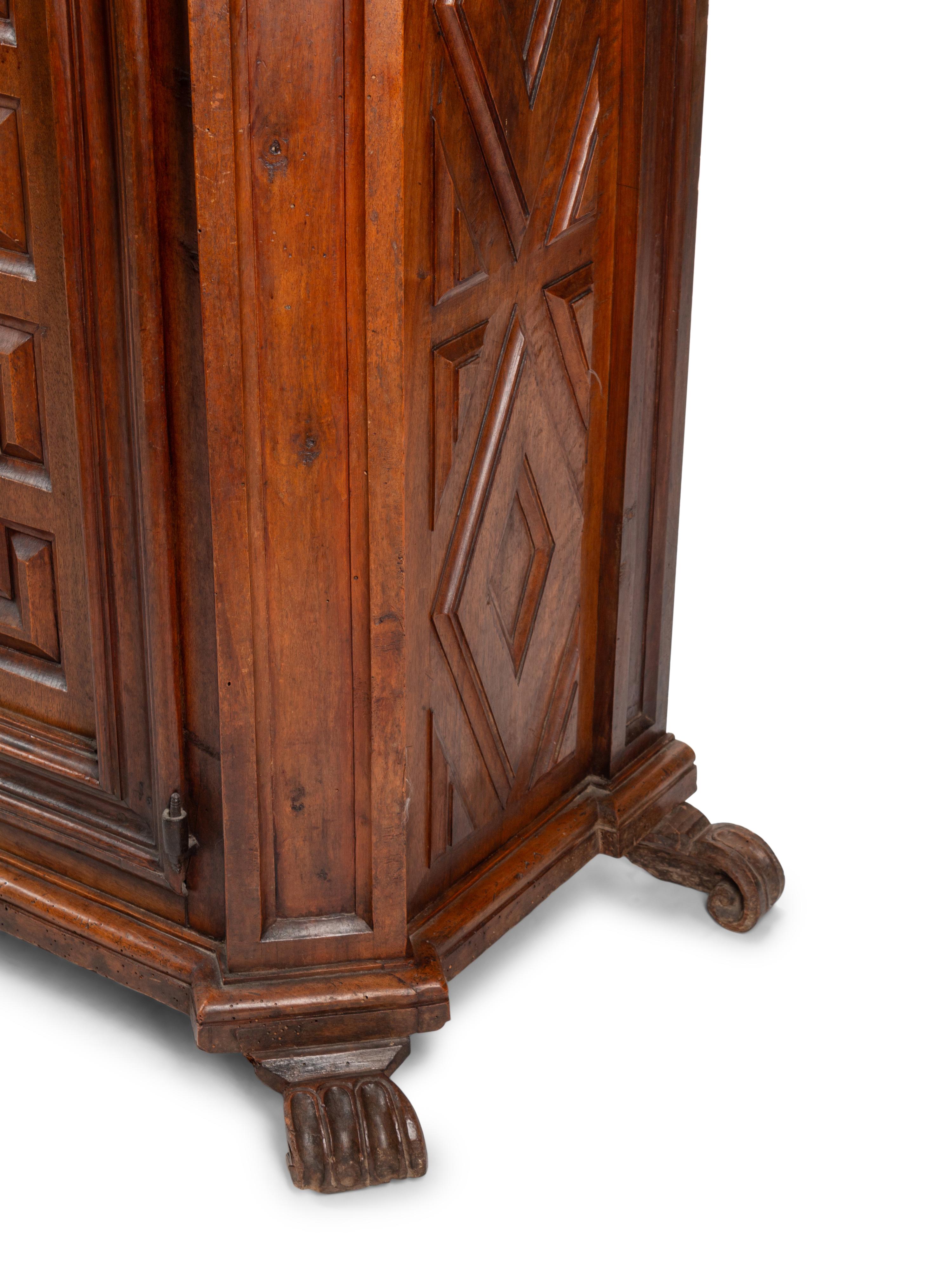 A Continental Walnut Two-Part Cabinet