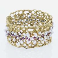 An 18K Yellow Gold and Gemstone Bangle by Karl Stittgen