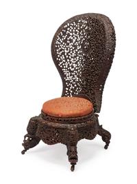 An Anglo-Indian Carved Slipper Chair