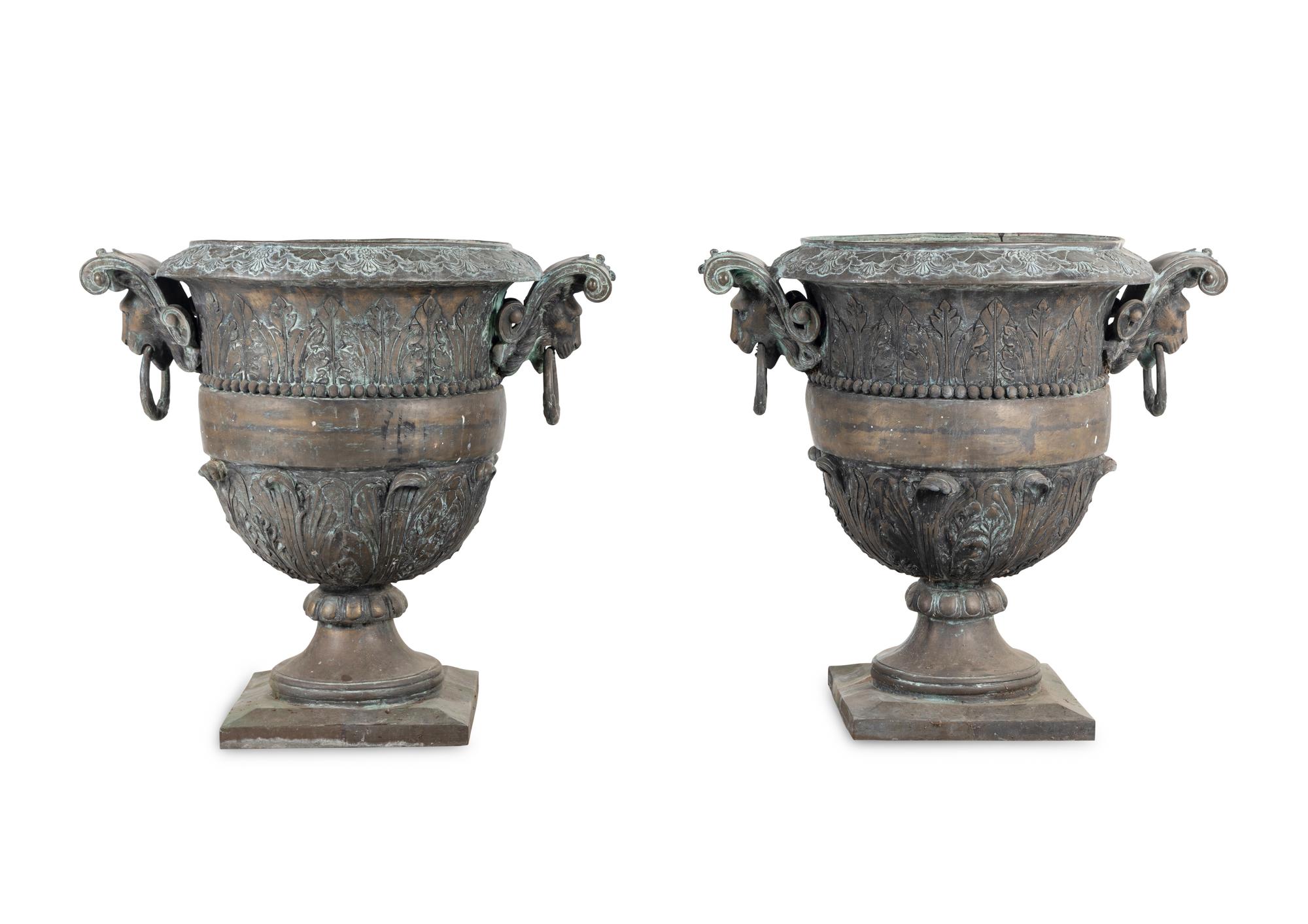 A Pair of Cast Metal Garden Urns