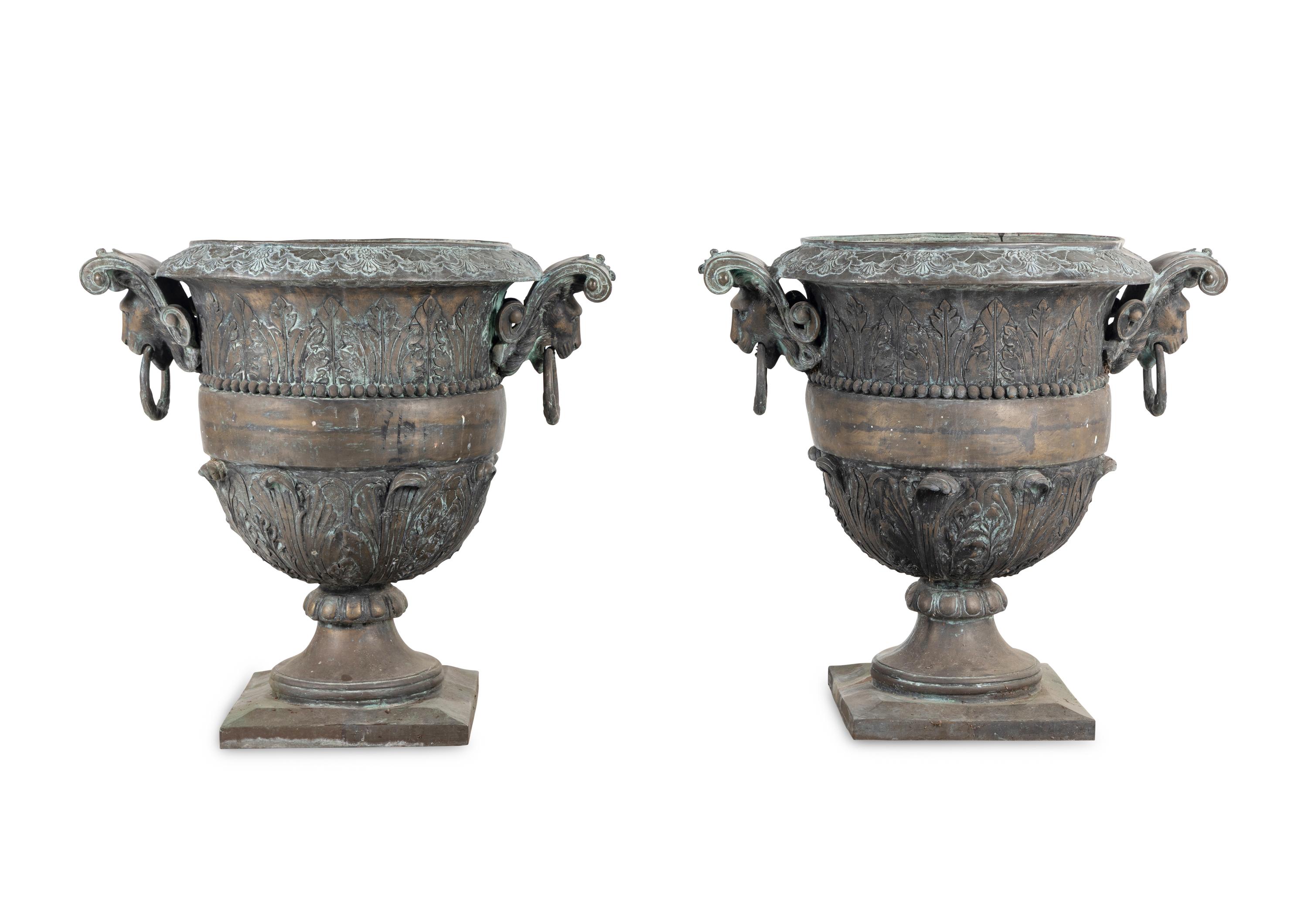 A Pair of Cast Metal Garden Urns