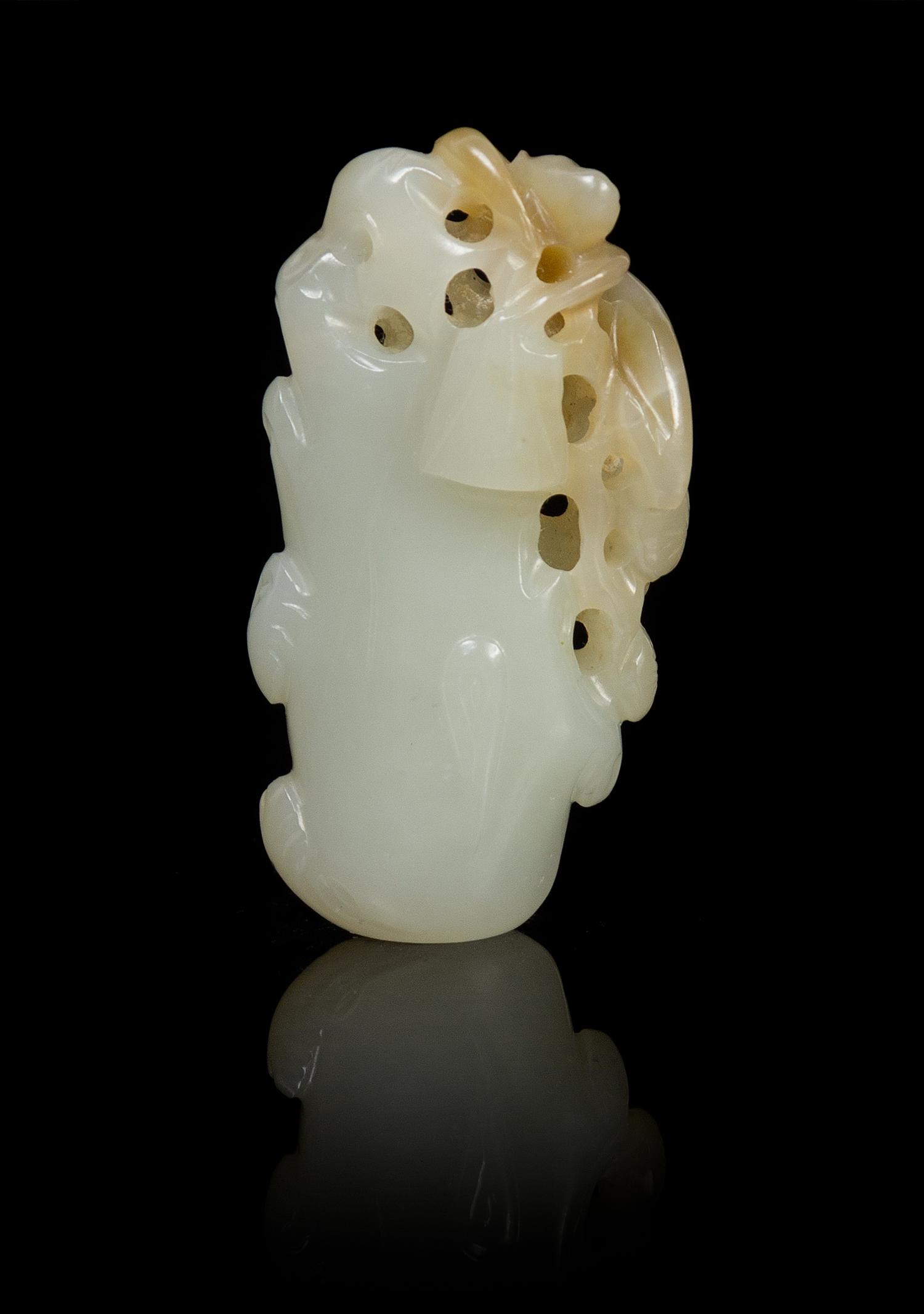 A Chinese Carved Jade Toggle 18TH/19TH CENTURY Length 2 1/8 inches. — 18TH/19TH CENTURY