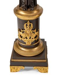 A Large Empire Style Gilt and Patinated Bronze Clock Garniture