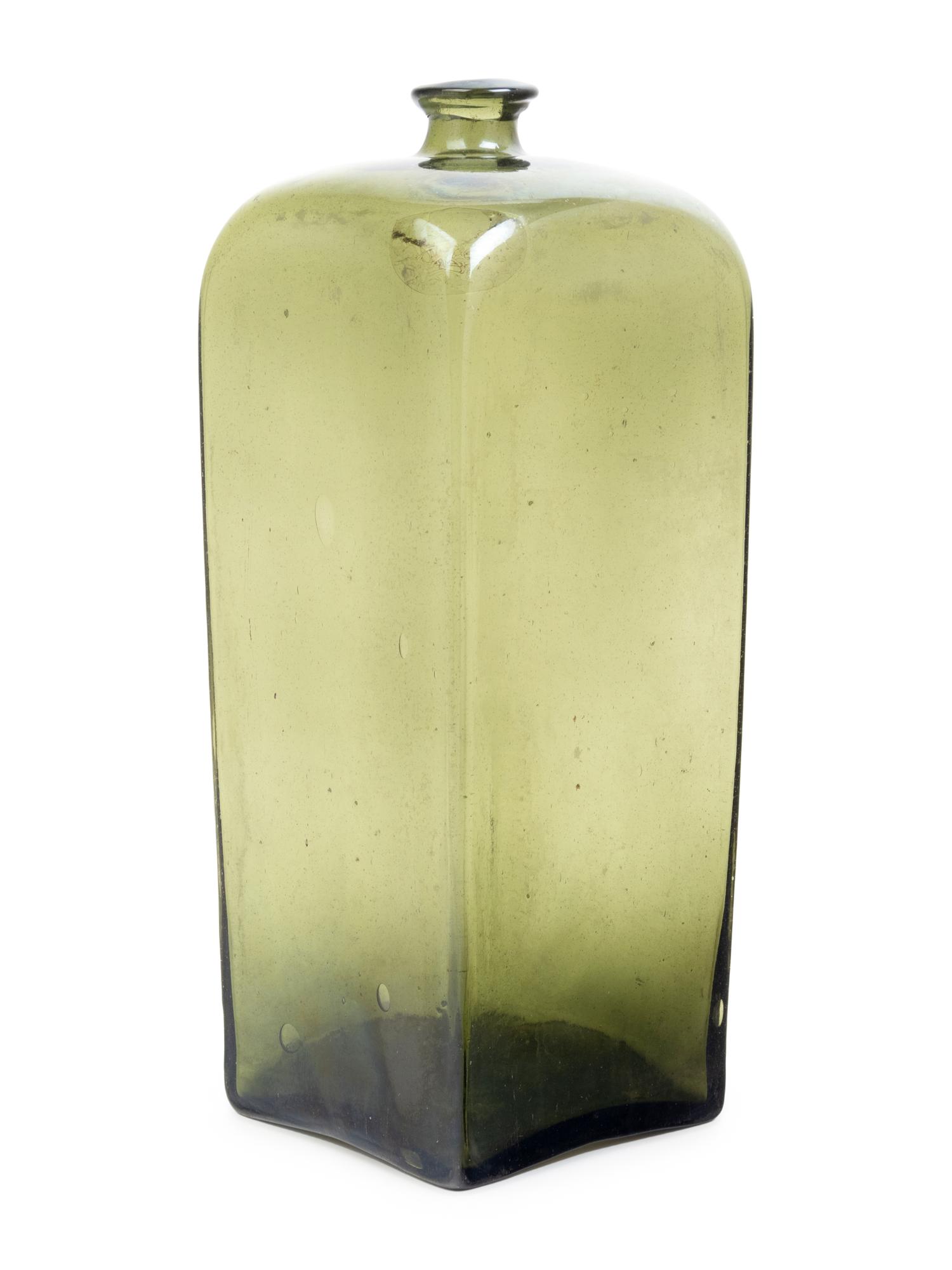 A Group of Colored Glass Bottles