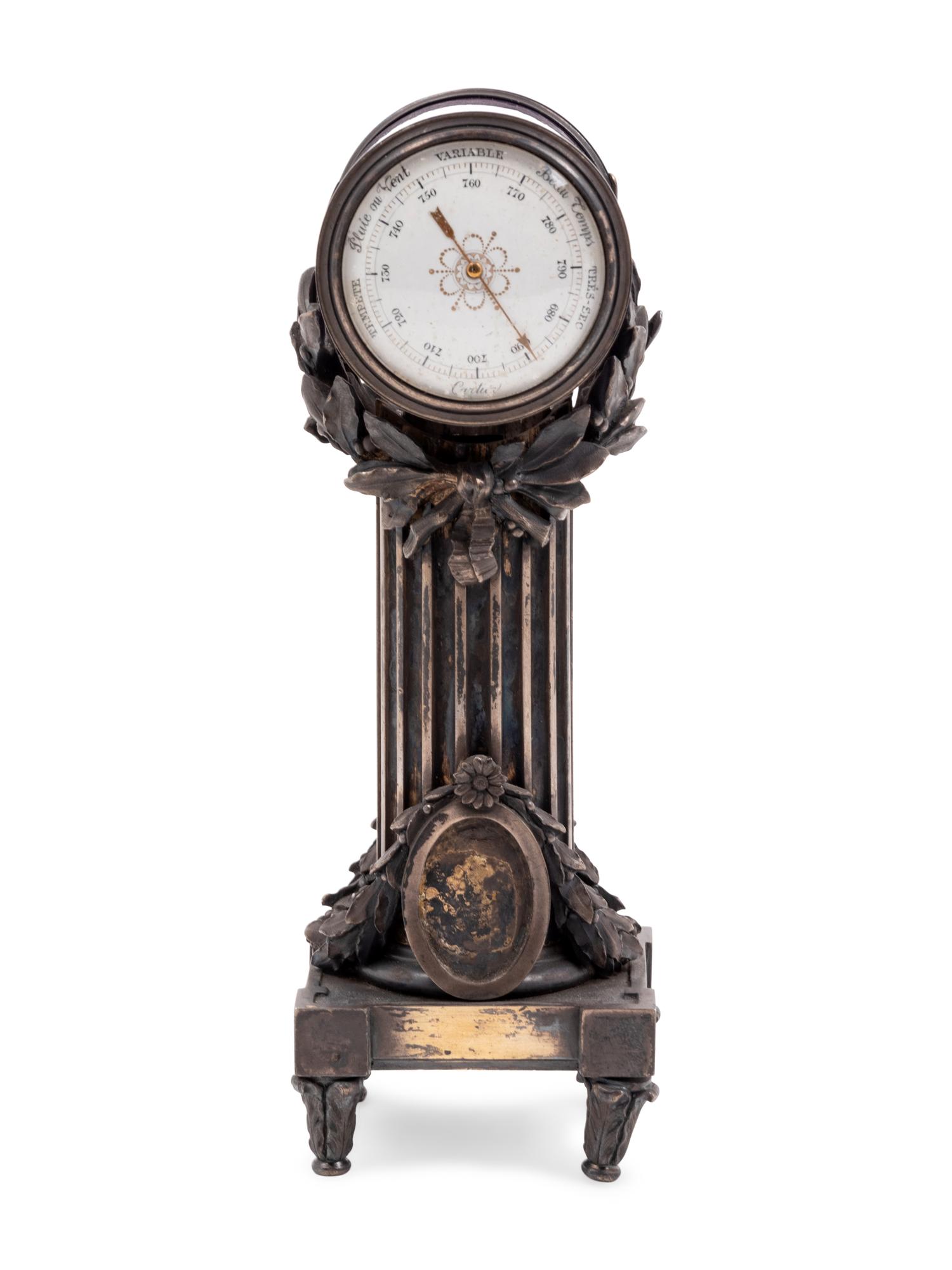 A Cartier Louis XVI Style Silver-Gilt and Guilloché Enamel Desk Clock and Barometer