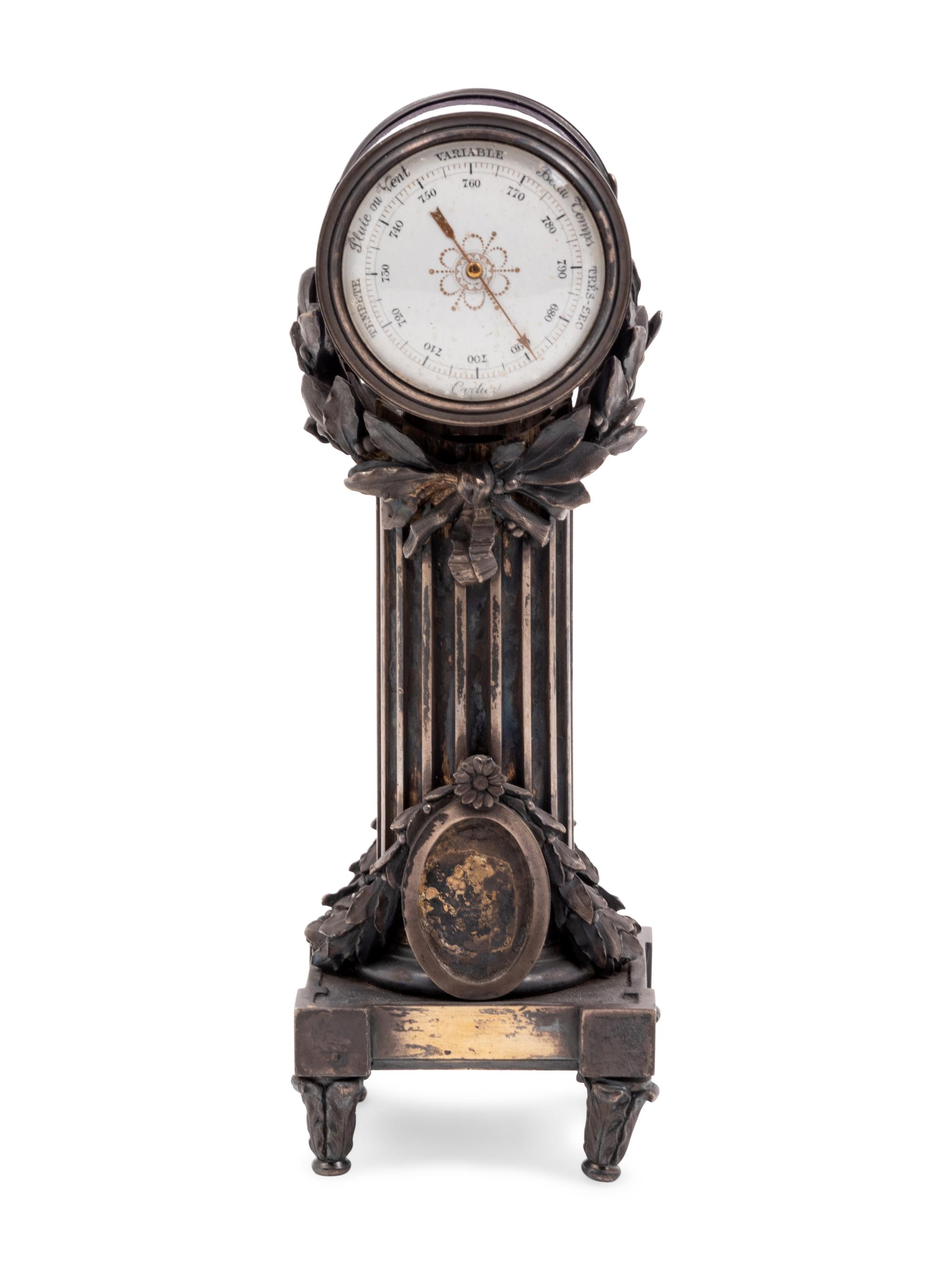 A Cartier Louis XVI Style Silver-Gilt and Guilloché Enamel Desk Clock and Barometer