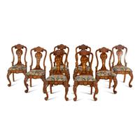 A Set of Eight Dutch Rococo Style Marquetry Dining Chairs