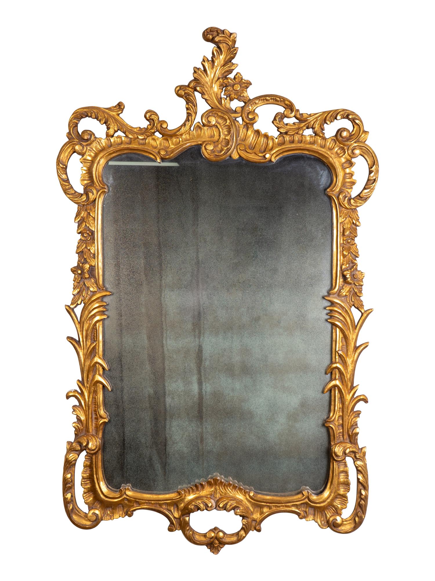 A Louis XV Style Giltwood Mirror — 20TH CENTURY