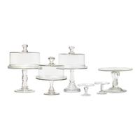 A Group of Nine Blown and Cast Glass Footed Cake Plates and Covers