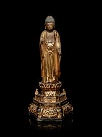A Hardwood Shrine with a Gilt Wood Figure of Buddha