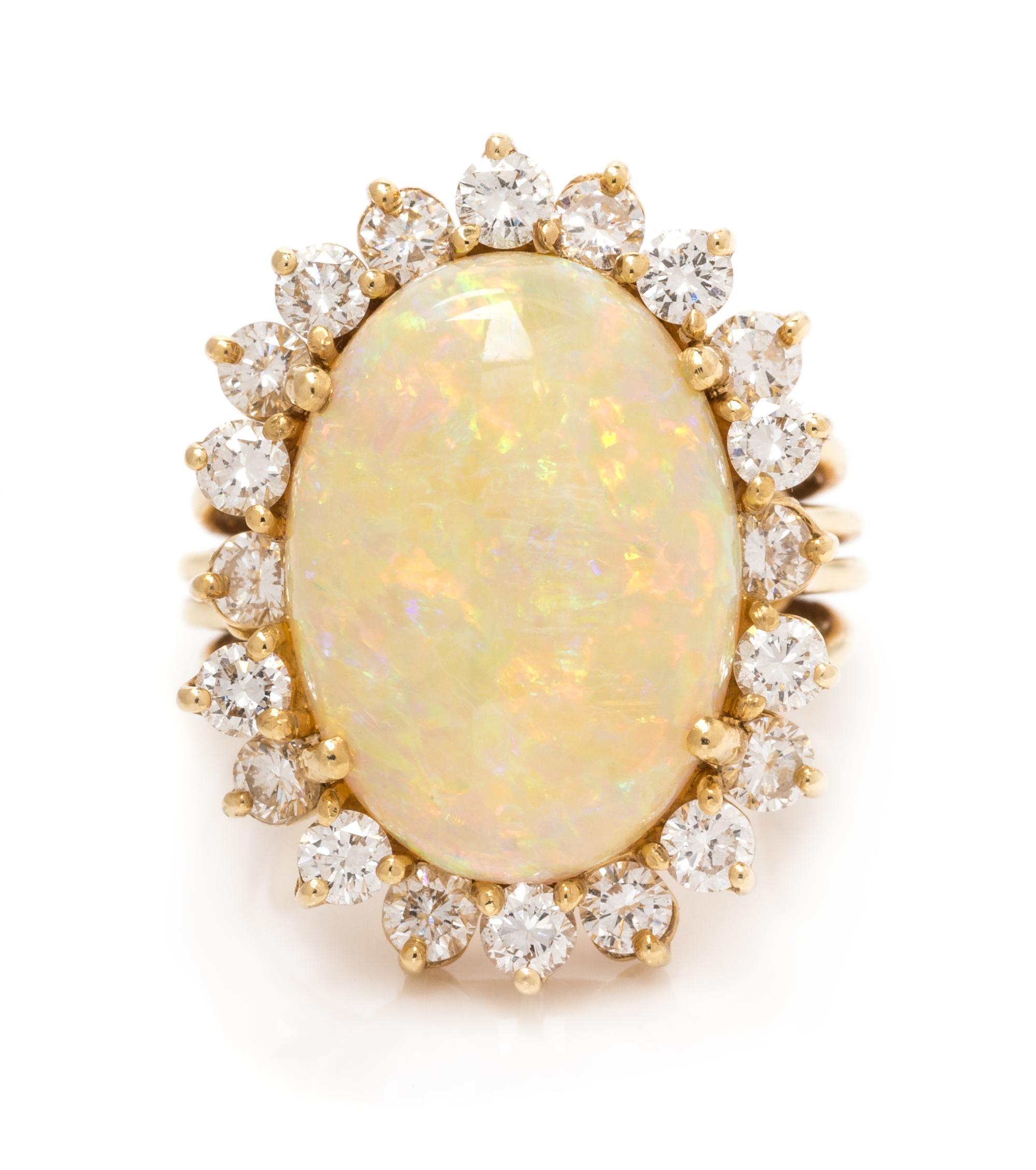 A 14 Karat Yellow Gold, Opal and Diamond Ring, Pacific Gem Co., 5.90 dwts.