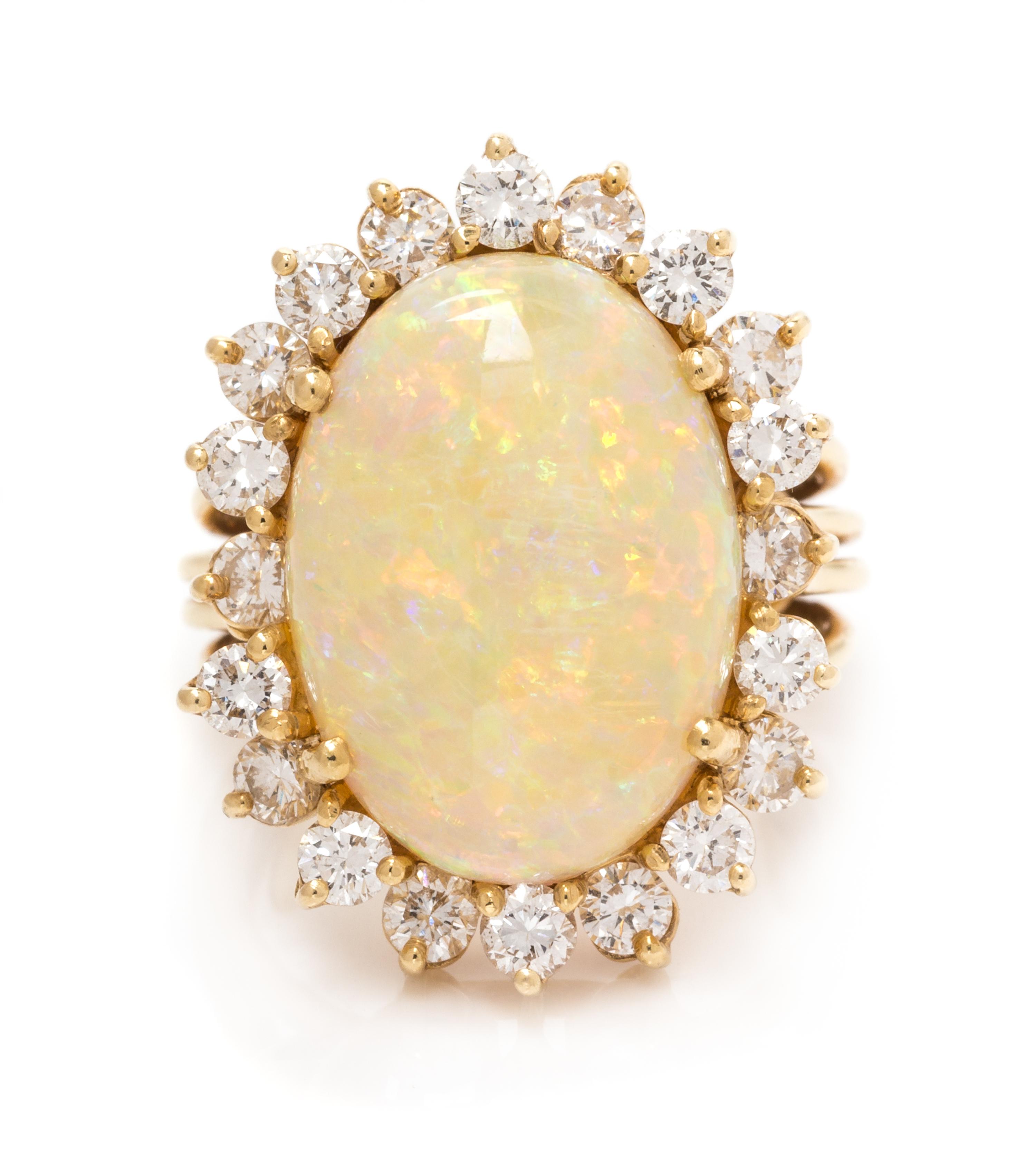 A 14 Karat Yellow Gold, Opal and Diamond Ring, Pacific Gem Co., 5.90 dwts.