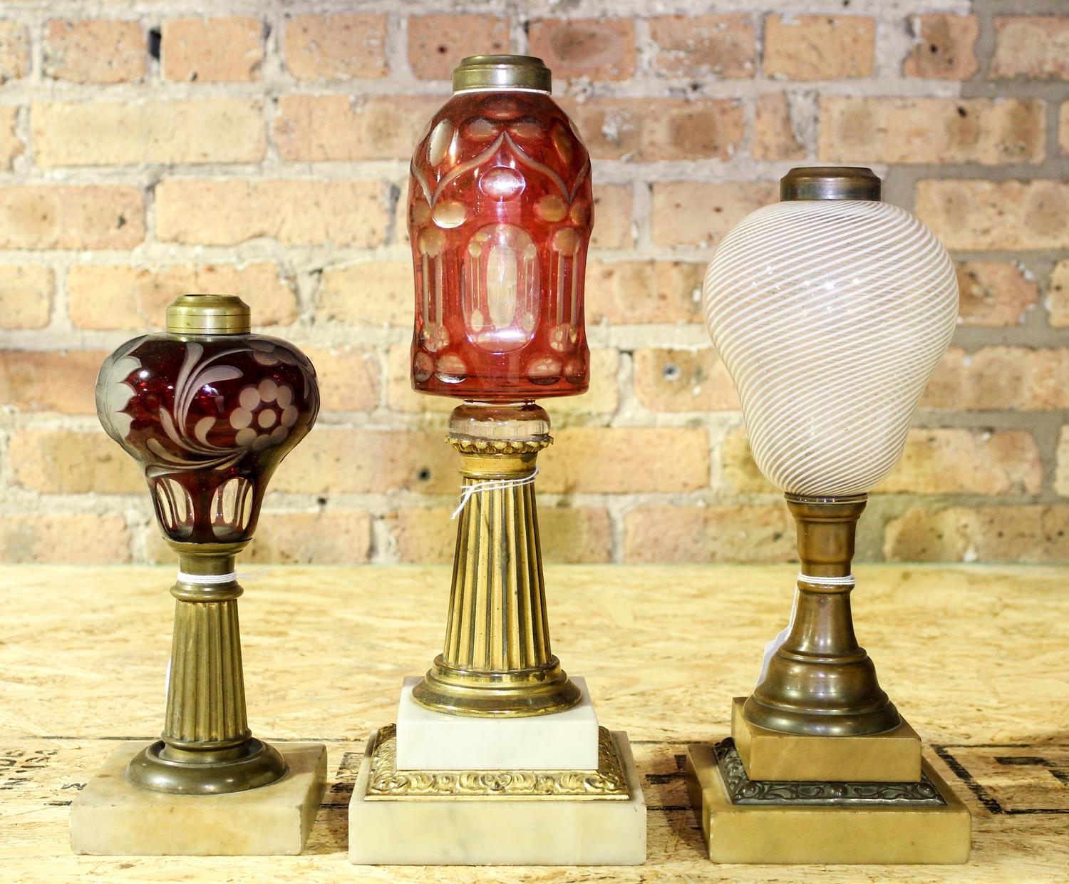 Three Glass Fluid Lamps. Height of tallest 14 inches.